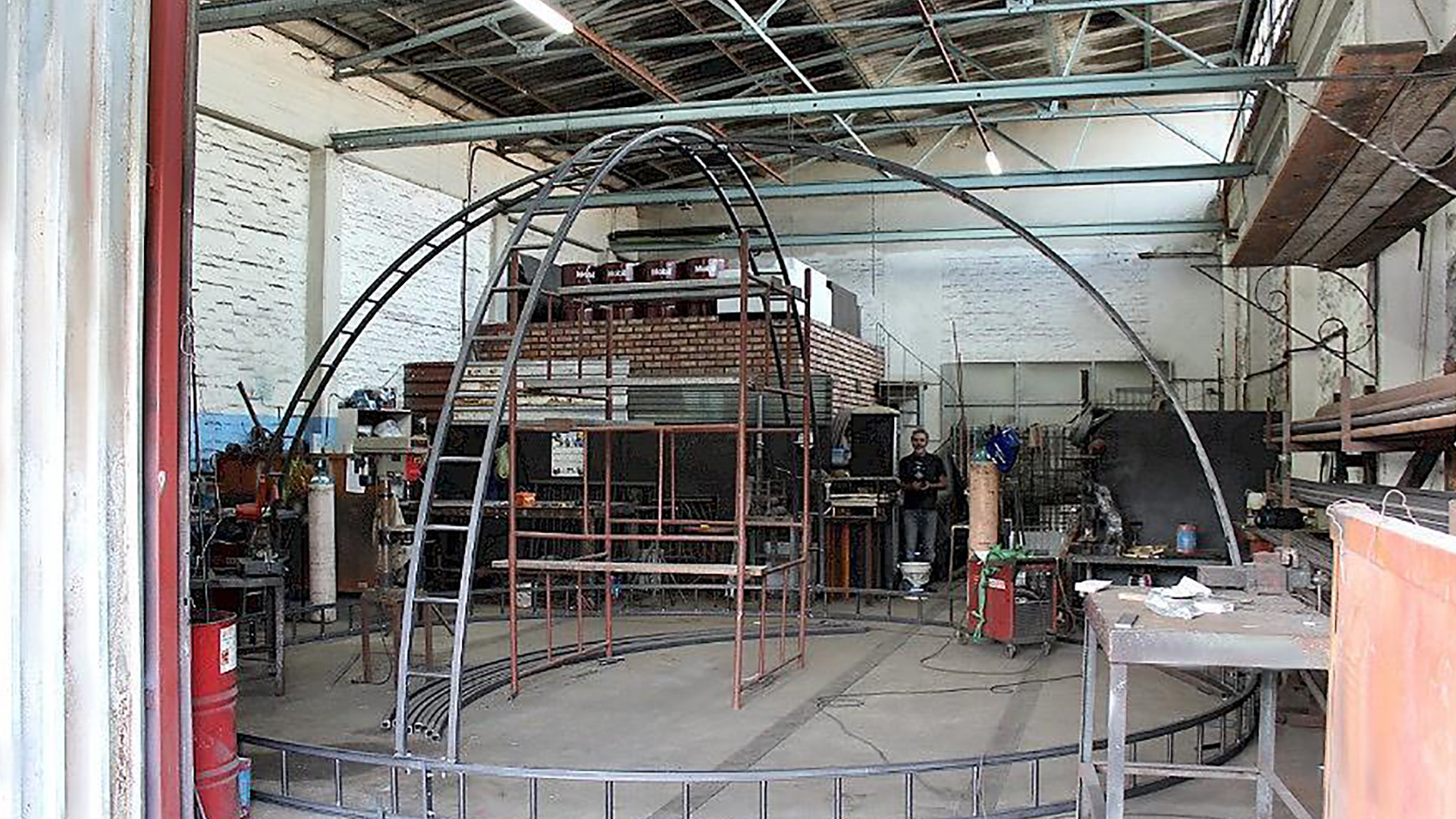 Ujiva under fabrication — the steel sphere taking shape in the workshop