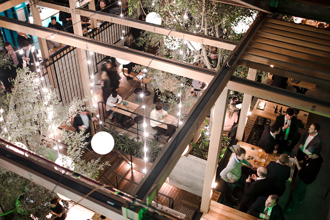 The Garden State Hotel beer garden from above — Small Globe strands through the timber frame