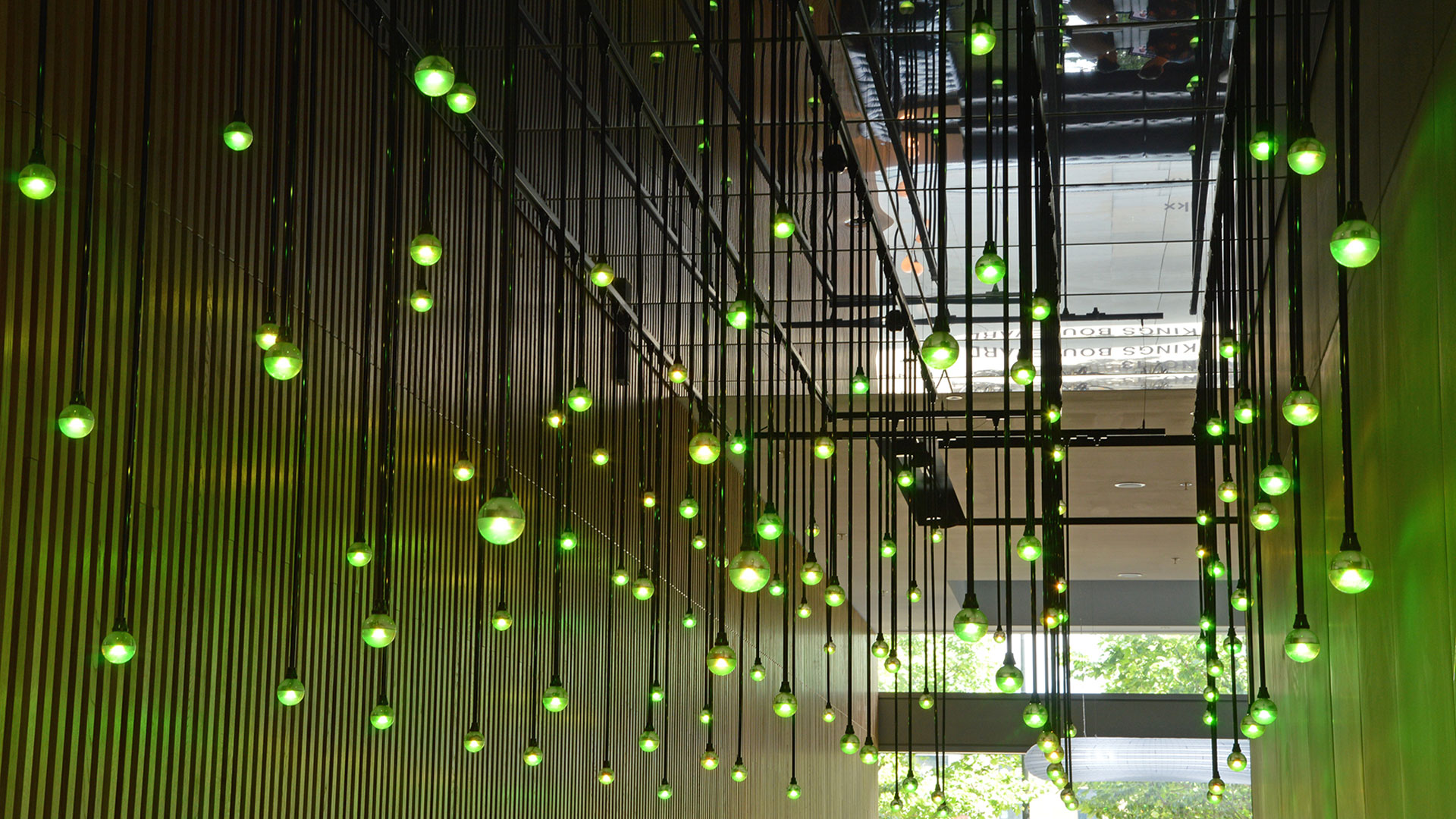 Green colour scene — pendant globe drops with mirrored ceiling above